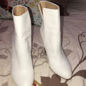 white heeled boots